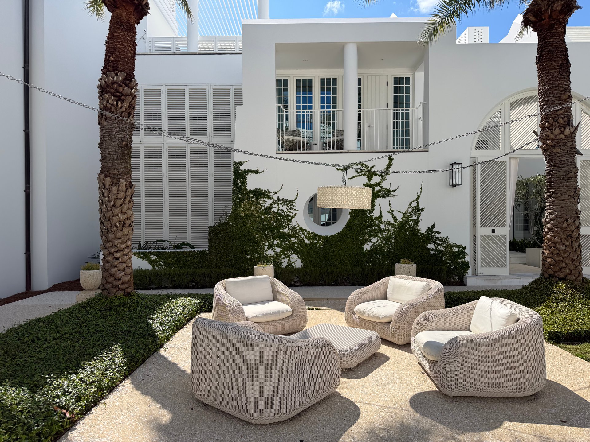Alys Beach Florida luxury real estate with white masonry architecture and private outdoor living
