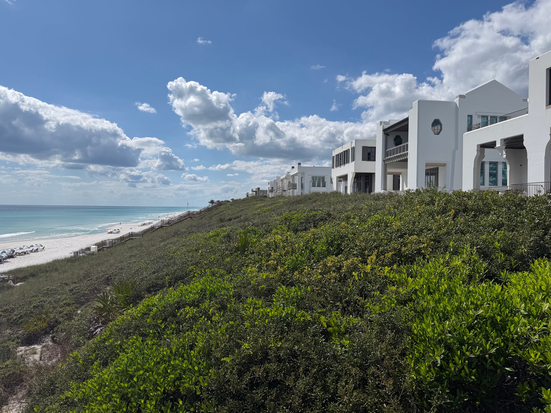 Gulf-front coastal homes and natural dunes along Scenic Highway 30A