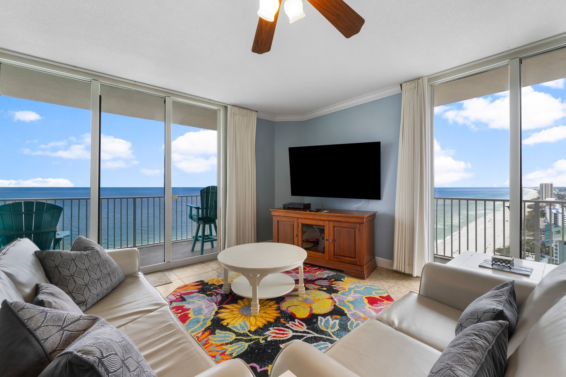 Gulf-front condo interior and balcony view in Panama City Beach