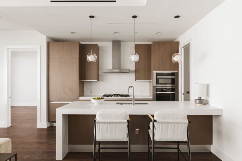 Kitchen in Residence 1805 at Bleu Ciel with waterfall island