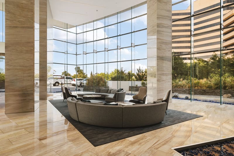 Lobby lounge at Bleu Ciel with floor-to-ceiling glass