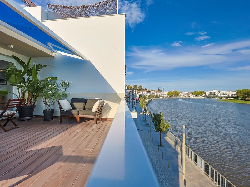 Terrace with Sado River views at a residence in historic Alc&aacute;cer do Sal
