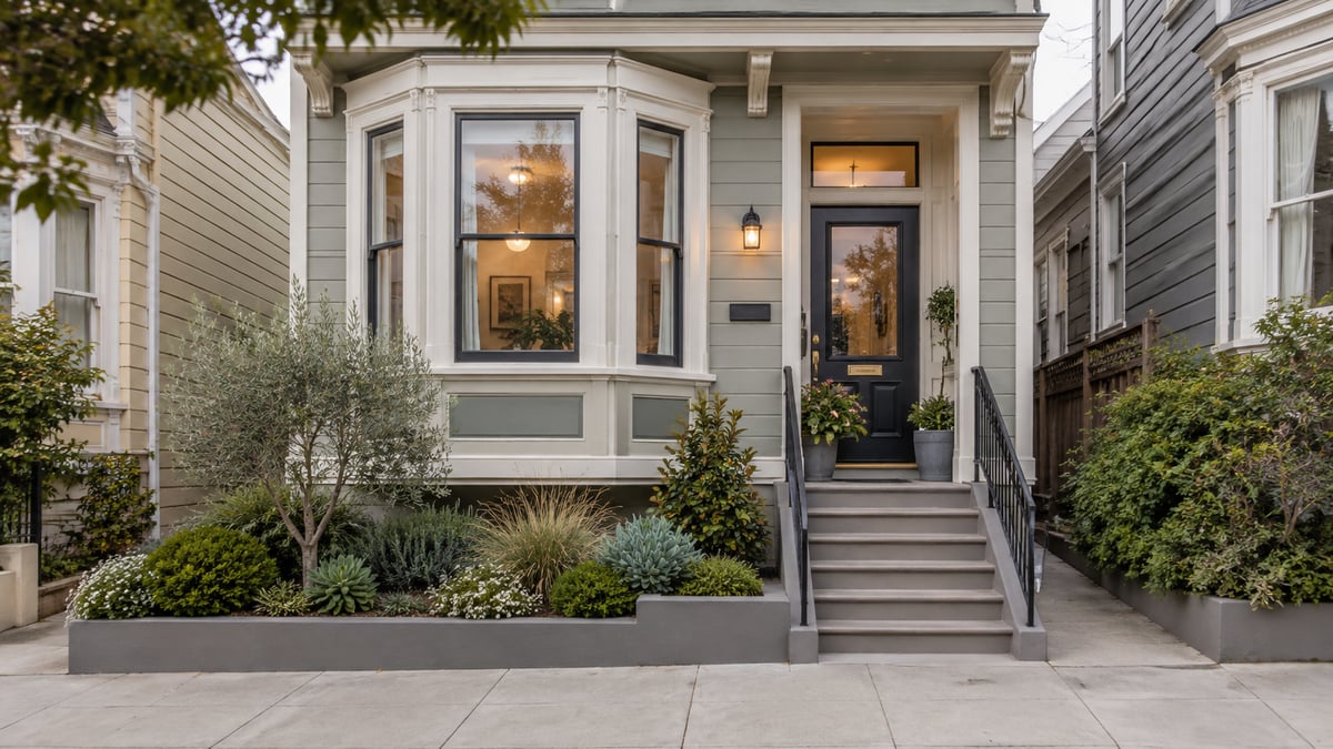 Gray San Francisco house with a bay window and a dark front door