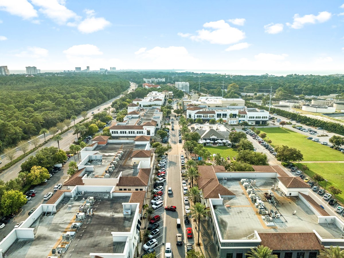 Aerial view of Grand Boulevard at Sandestin town center with Highway 98 and the Gulf of Mexico beyond