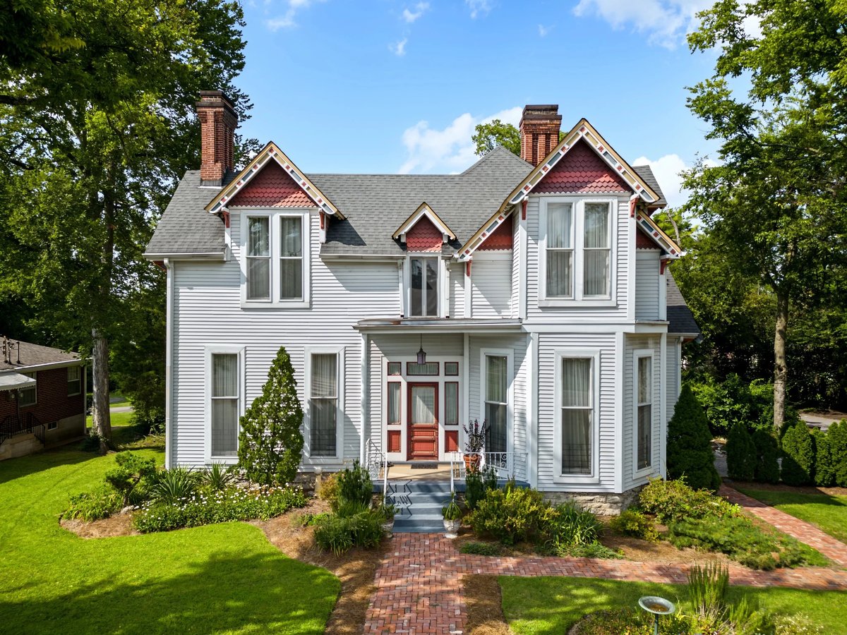 Nashville house with tall front windows, decorative gables and a covered entrance at 2500 Woodlawn Drive