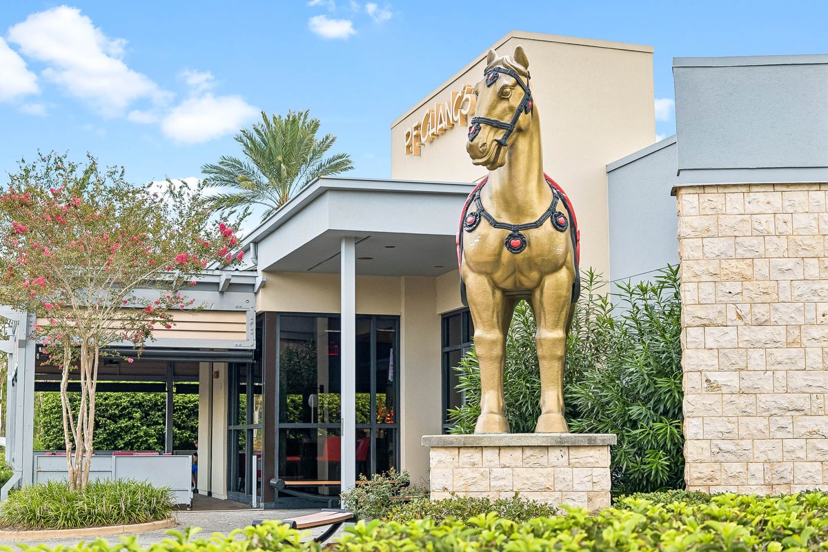 P.F. Chang's entrance with its gold horse statue at Grand Boulevard at Sandestin, Miramar Beach FL