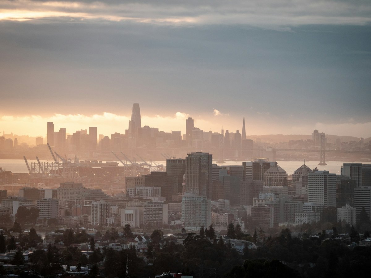 The San Francisco skyline at sunset seen across the bay from the East Bay