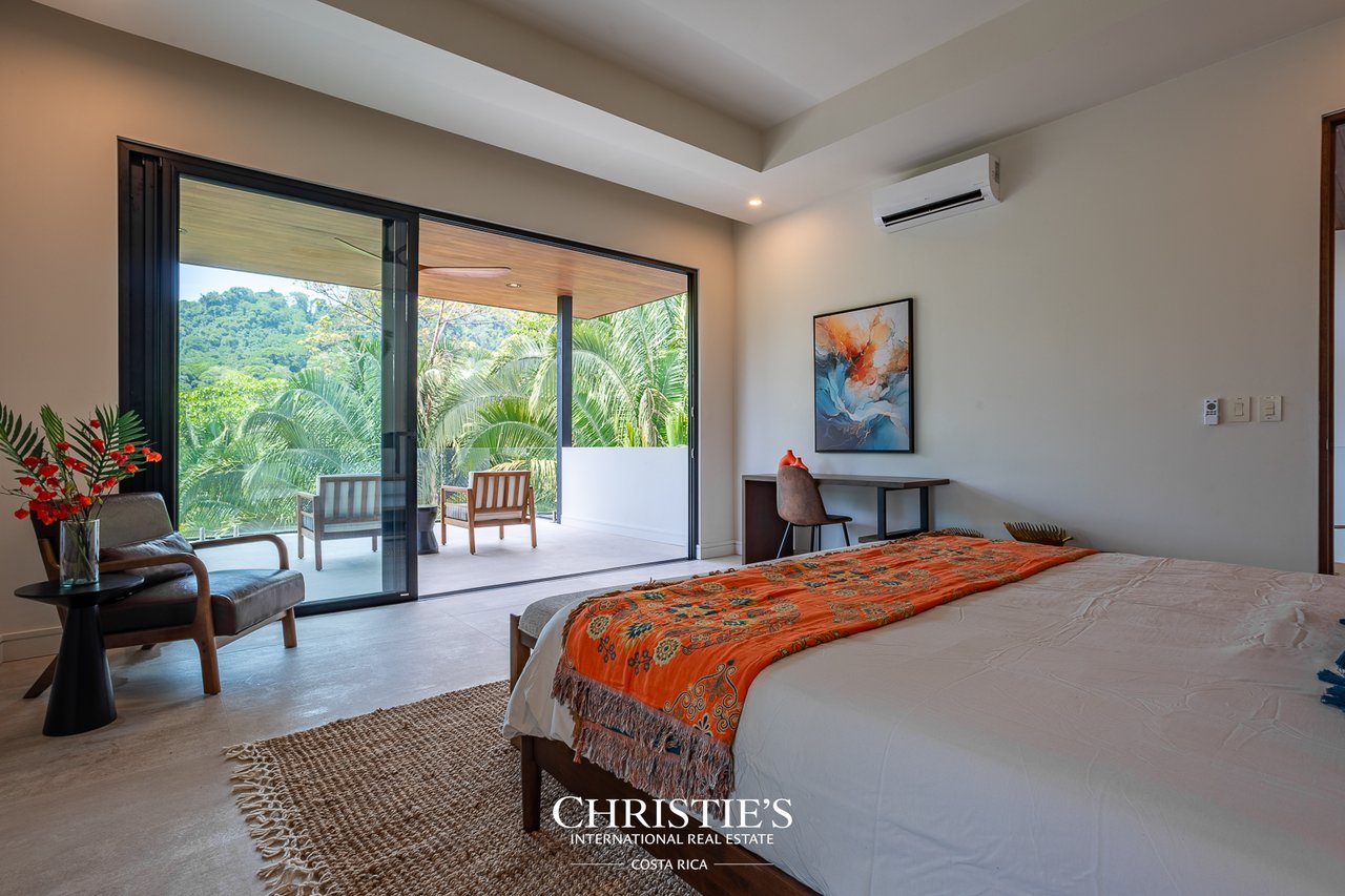 Modern Tropical Ocean & Mountain View Home