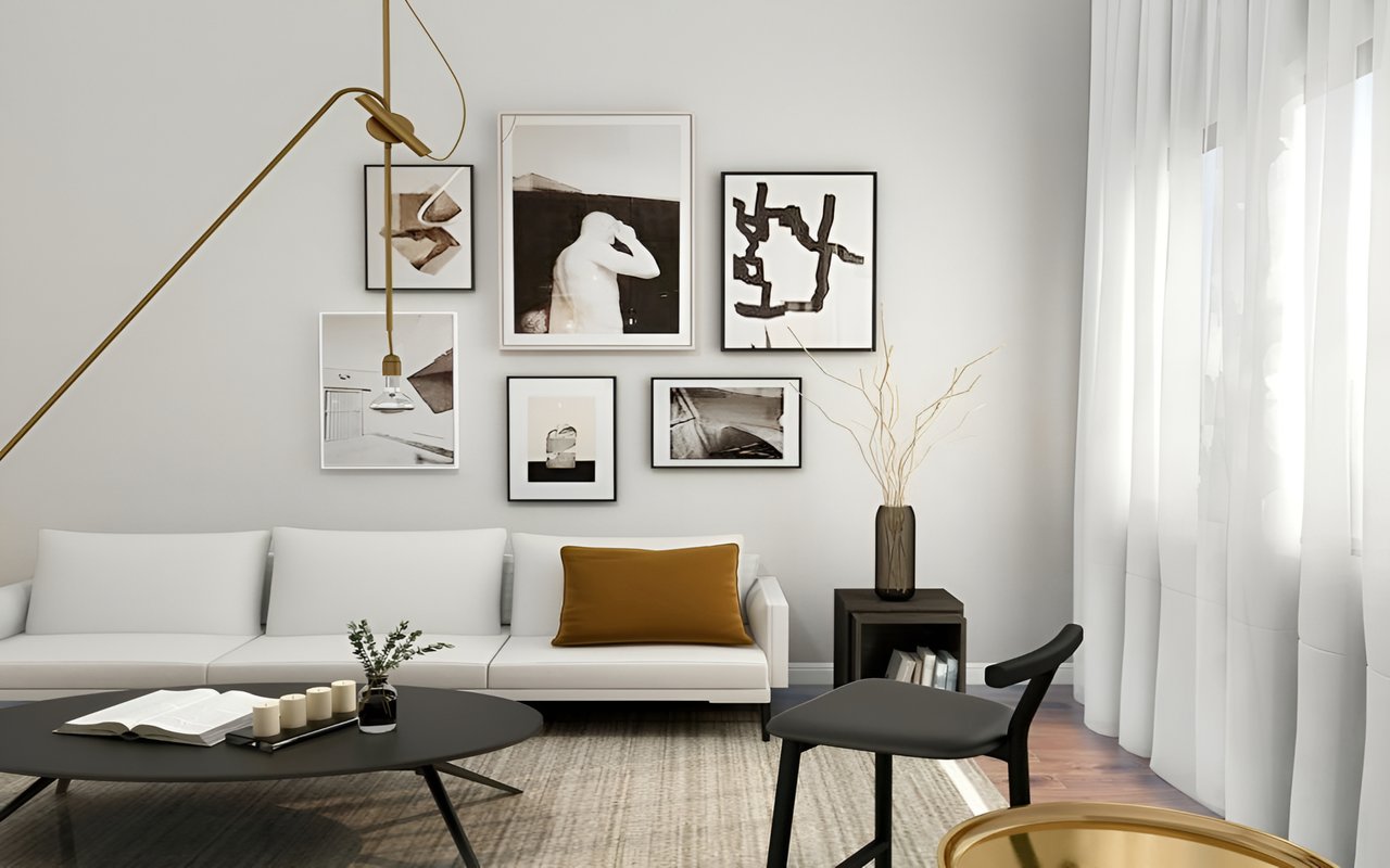 Modern living room with a white sofa, mustard cushion, and gallery wall above it.