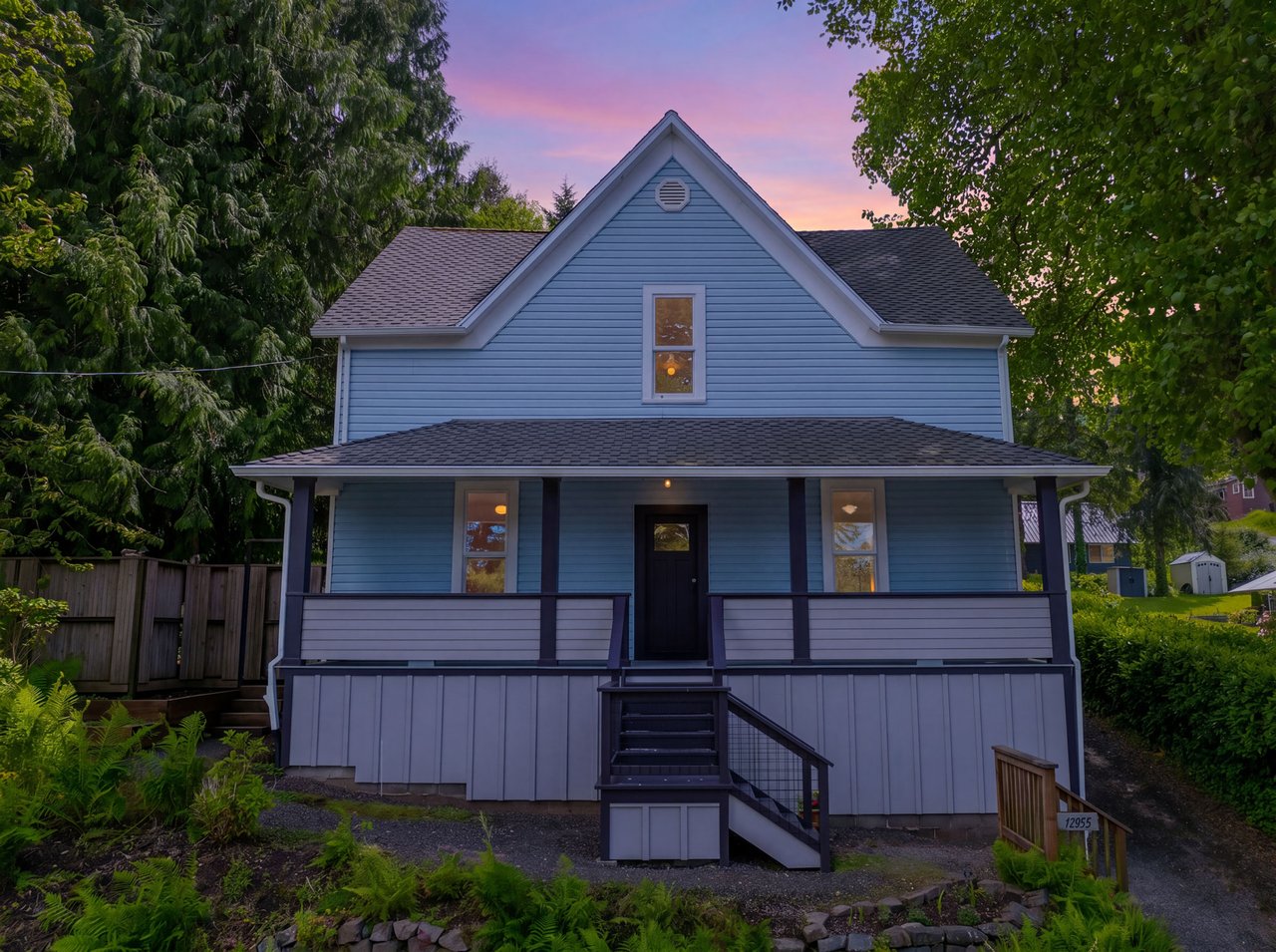 Sold historic foursquare home at 12955 Tohls St in Nehalem, Oregon, listed by Shelley Parker of Home + Sea Realty, with original character, updated systems, garden space, and greenhouse.