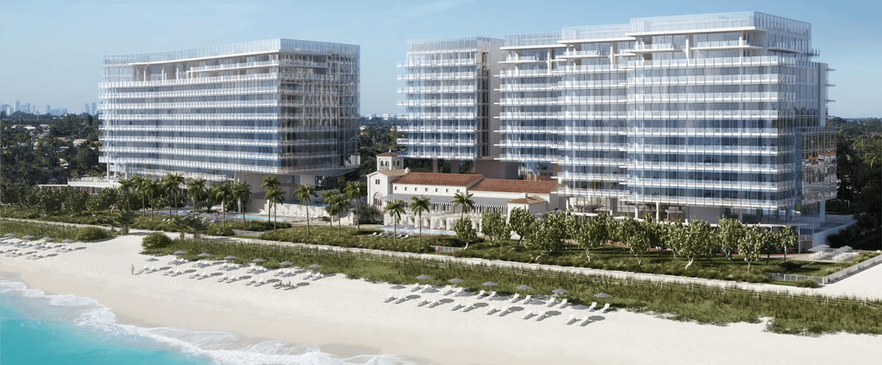 Four Seasons Surf Club residences, two glass towers along a landscaped beachfront.