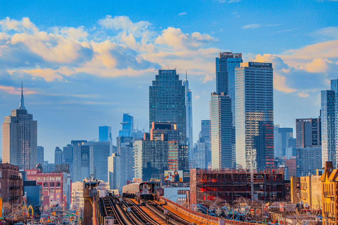 The L Haus luxury condominium at 11-02 49th Avenue in Hunters Point, Long Island City, featuring contemporary architecture, landscaped courtyard, full-service amenities, and luxury residences.
