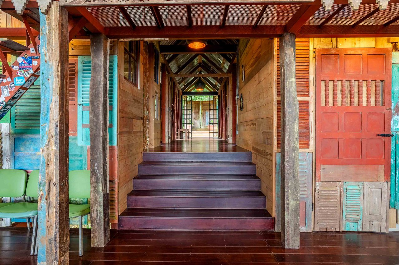 A Handcrafted Residence Immersed in Nature Above the Canopy Ocean View Architectural Home