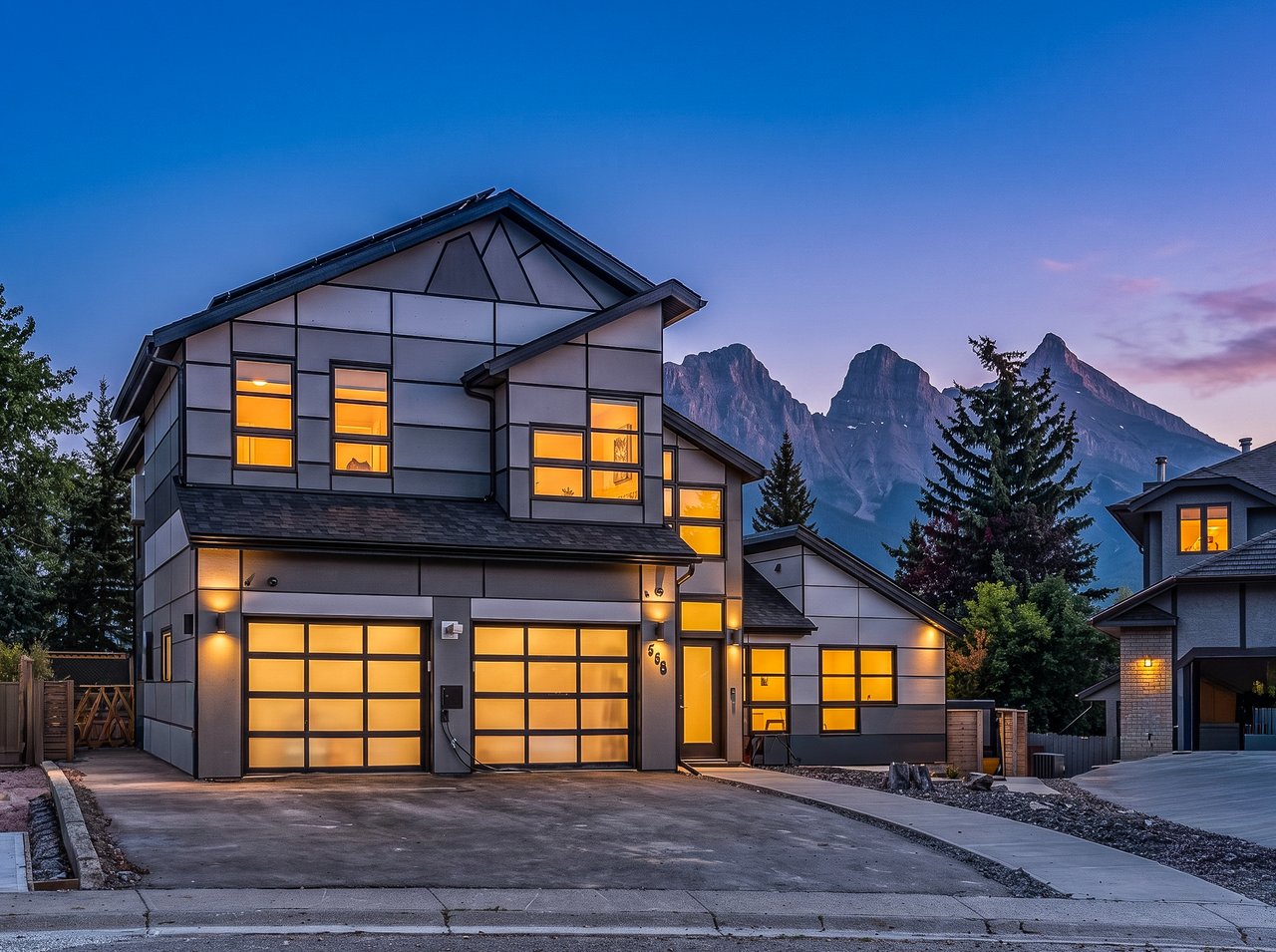 Front Exterior at Dusk 258 Grizzly Crescent, Canmore, AB