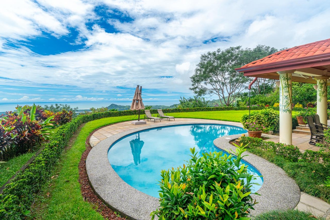 Ocean, jungle & mountain views on a meticulously landscaped 3-home family compound