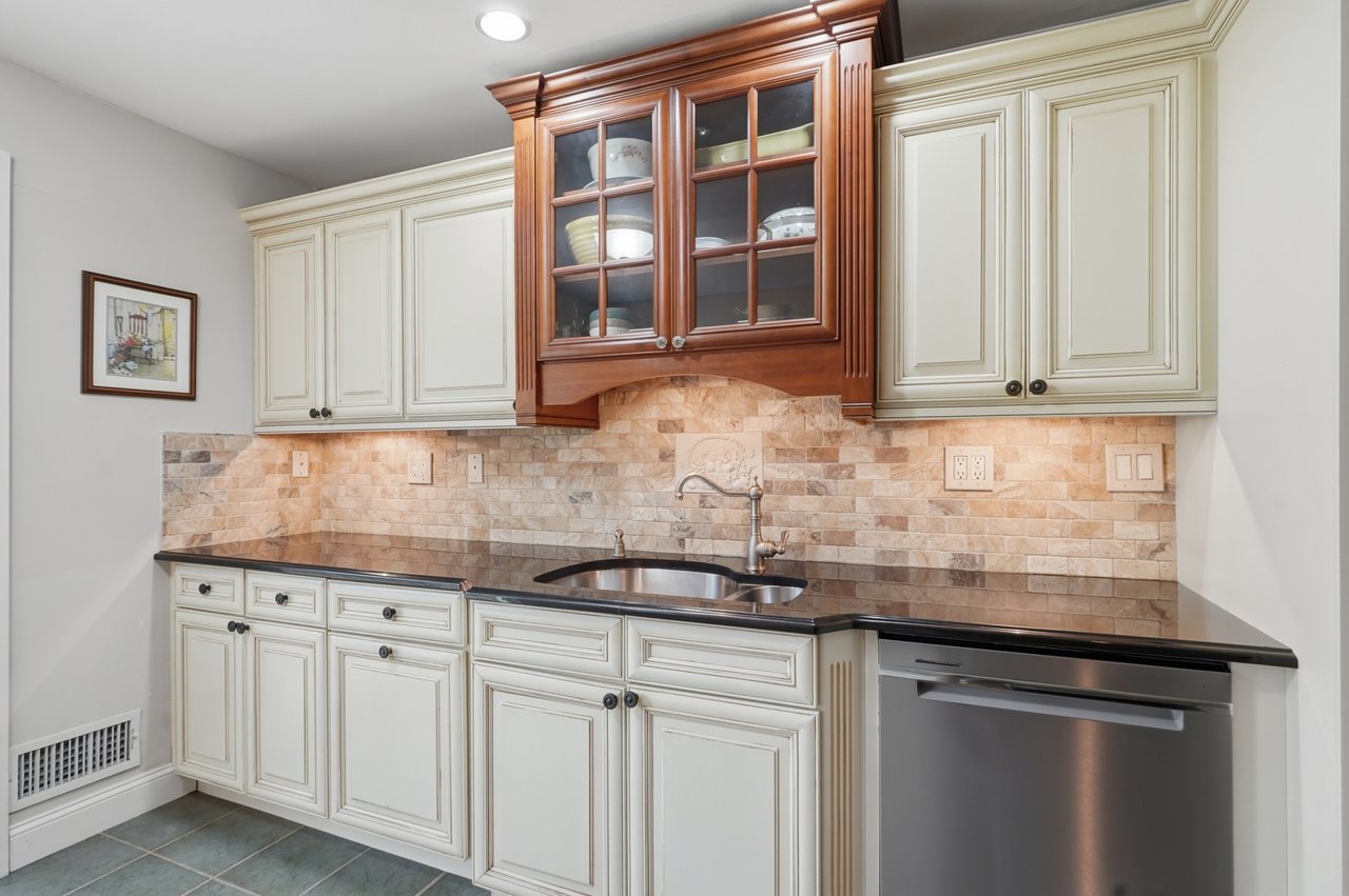 Sink, dishwasher, and accent cabinet