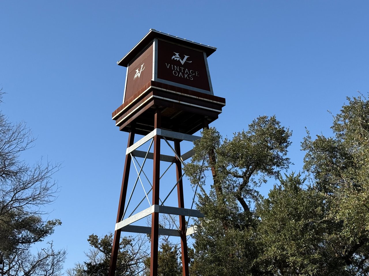 Vintage Oaks community landmark tower in New Braunfels 78132, representing luxury Hill Country living.