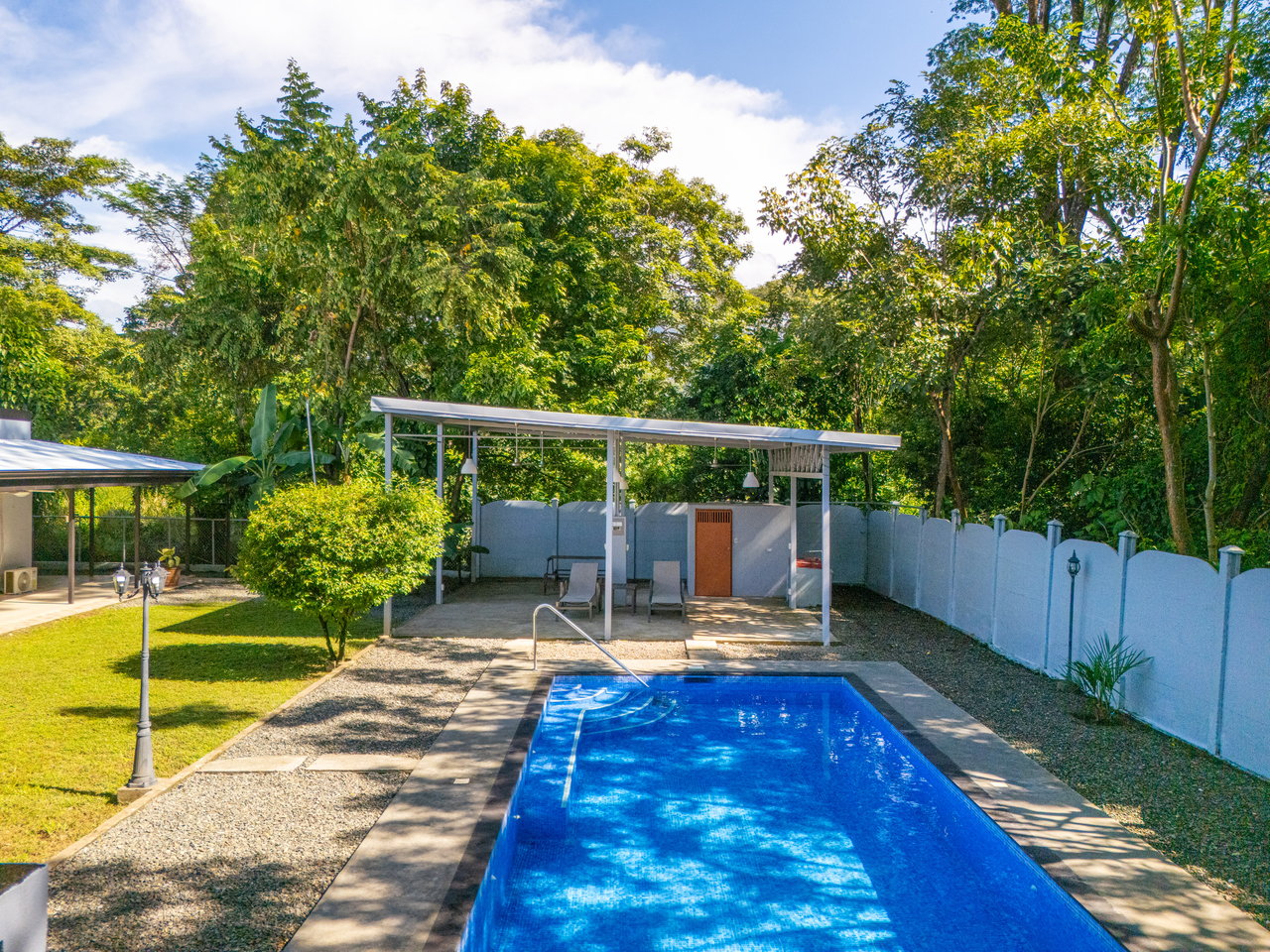 3-Bedroom Home on a Double Lot with Large Pool Backing to Jungle