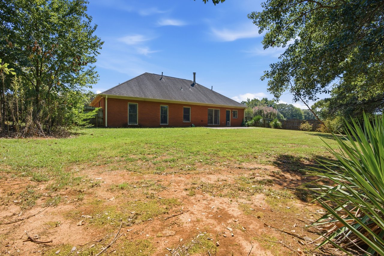 Full-Brick Beauty with Spacious Corner Lot & Private Fenced Backyard
