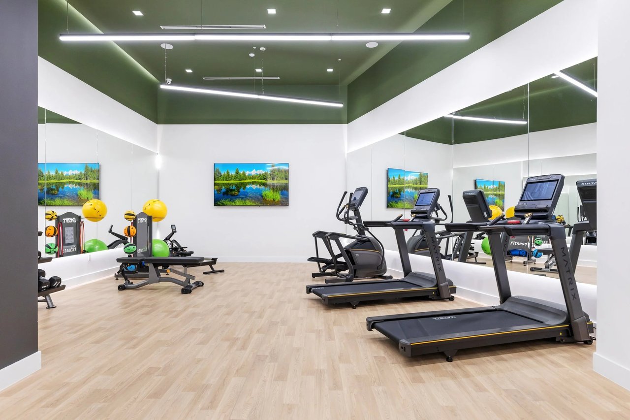 Arbor Coconut Grove fitness center with cardio and strength equipment
