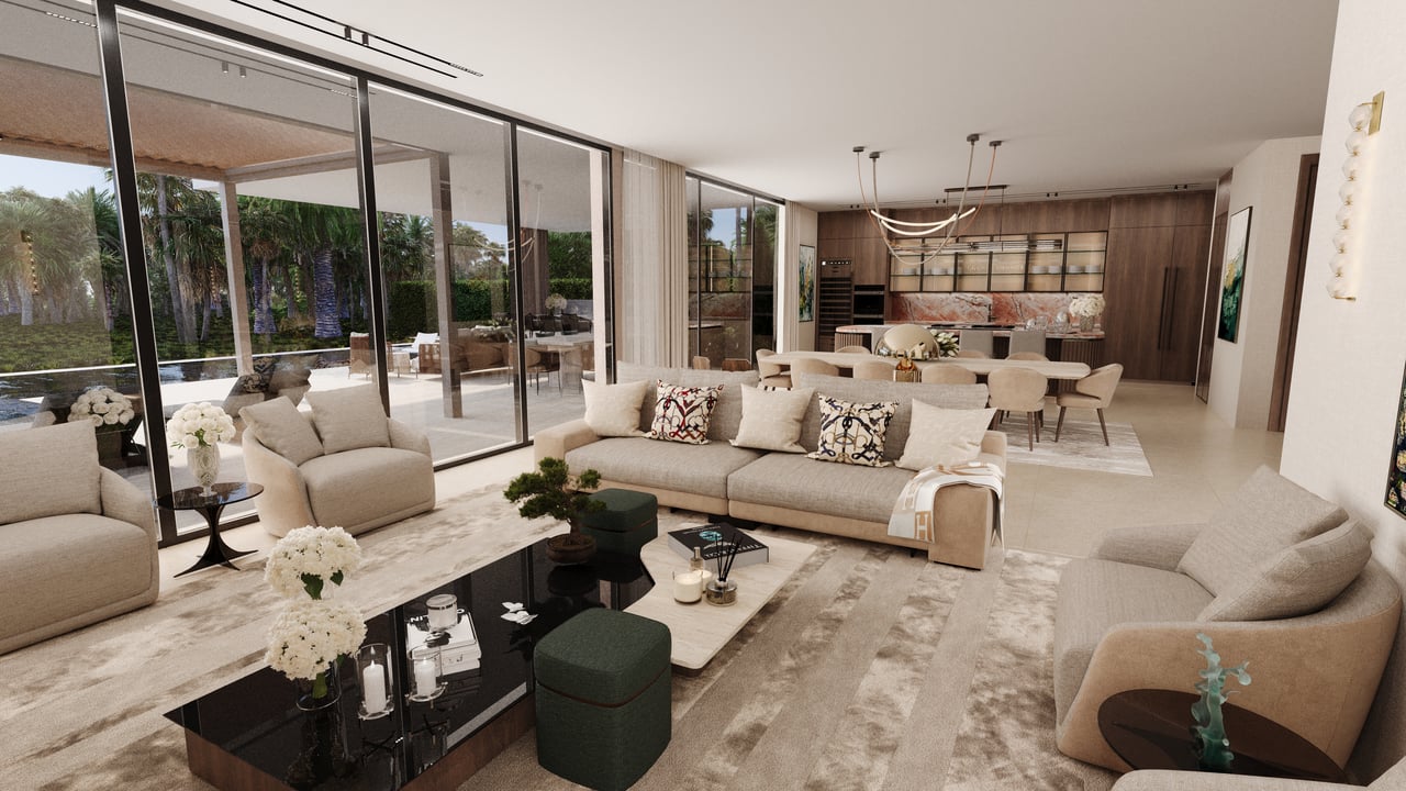 Open-plan living room with neutral sofas, a dining area, and floor-to-ceiling windows overlooking palms.