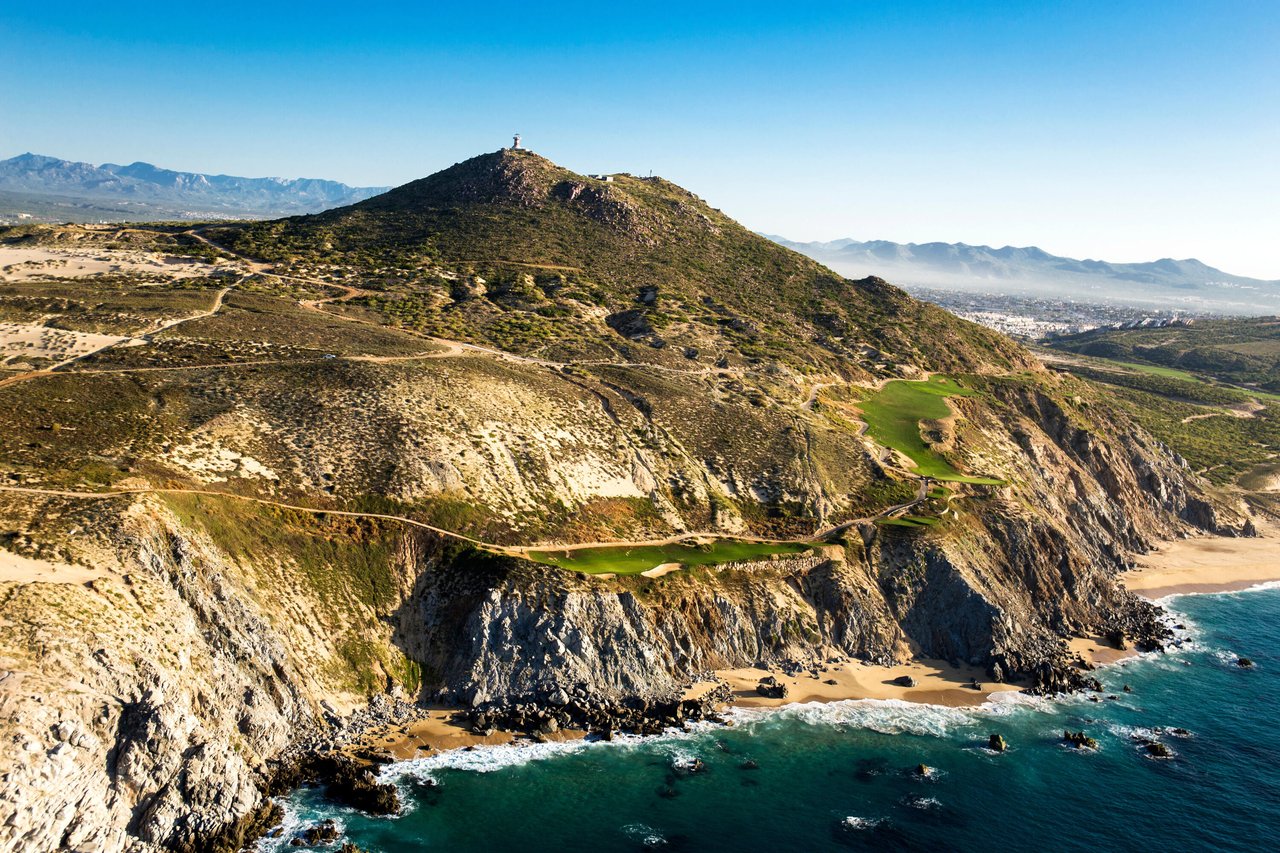 Aerial view of Quivira golf course on the sea cliffs with the Old Lighthouse