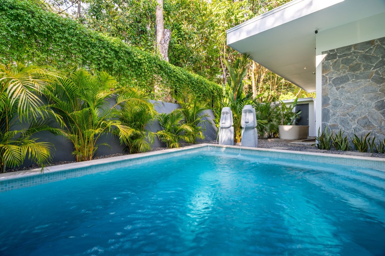 Stunning 3-Bedroom, 2.5-Bathroom Tropical Mid-Century Modern Home – Steps from the Beach