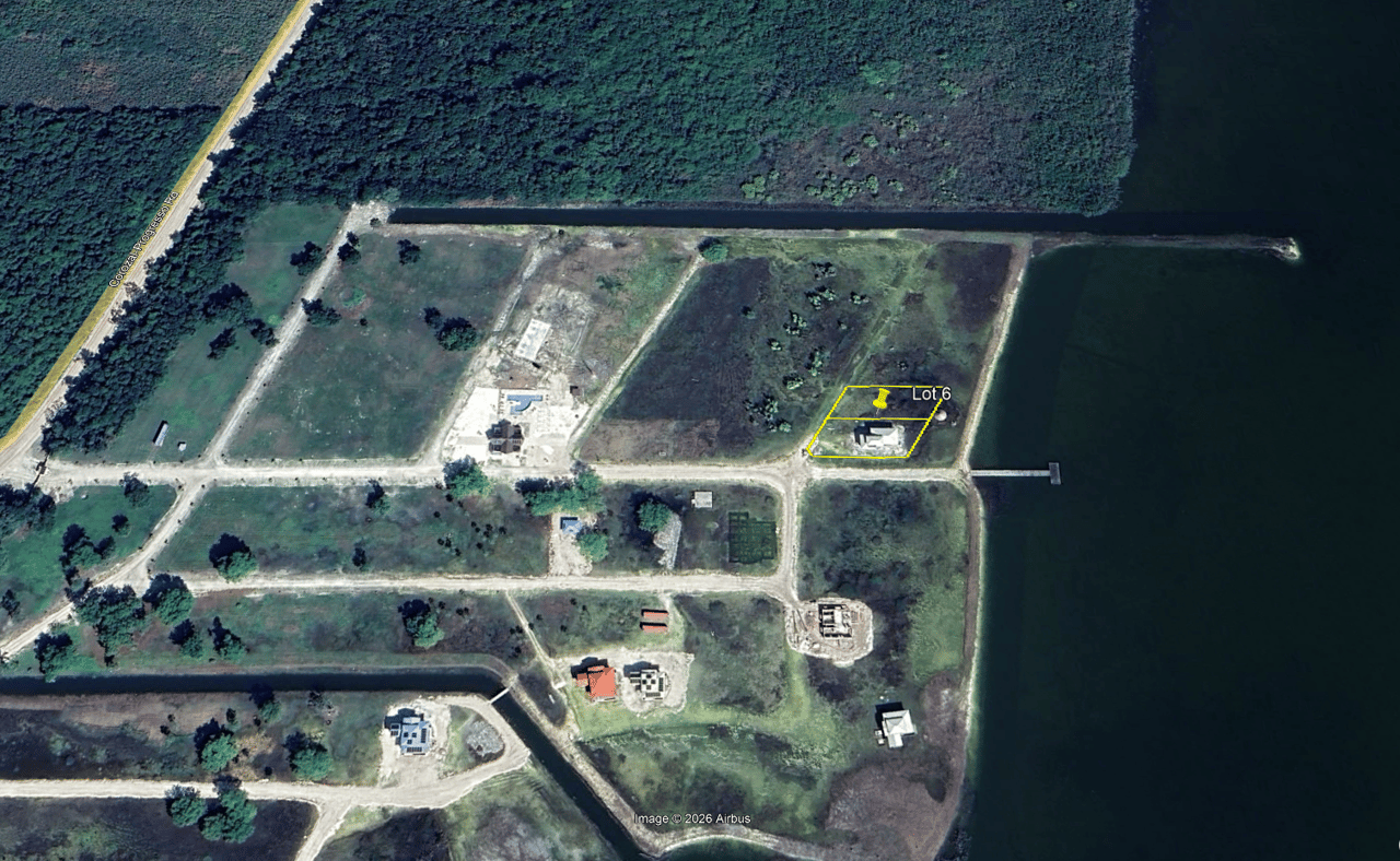 Vacant waterfront lot in a luxury master-planned gated residental community in northern Belize