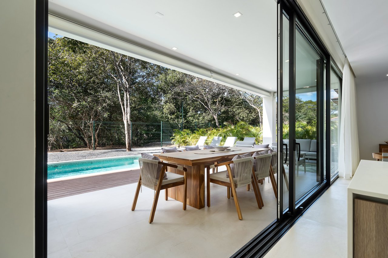 Villa Tropical Dawn | 4-Bedroom Modern Oasis in Bosques de Pinilla with Forest Views & Resort-Style Amenities