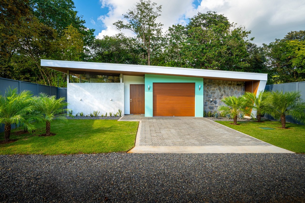 Stunning 3-Bedroom, 2.5-Bathroom Tropical Mid-Century Modern Home – Steps from the Beach