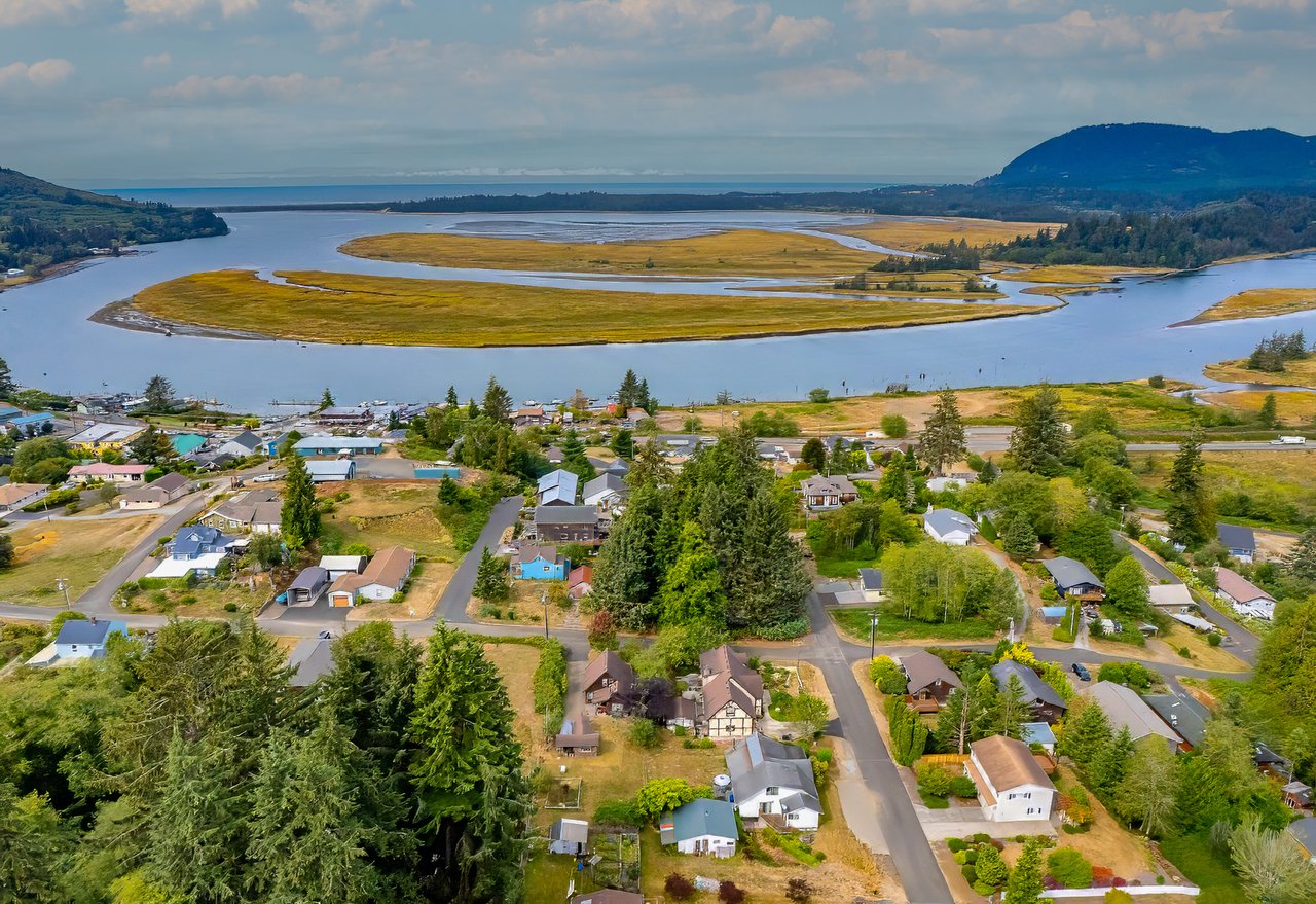 Sold double corner lot at VL 3rd Spruce TL2200 in Wheeler, Oregon, represented by Erin Laskey of Home + Sea Realty, with potential river and mountain views near downtown and the marina.