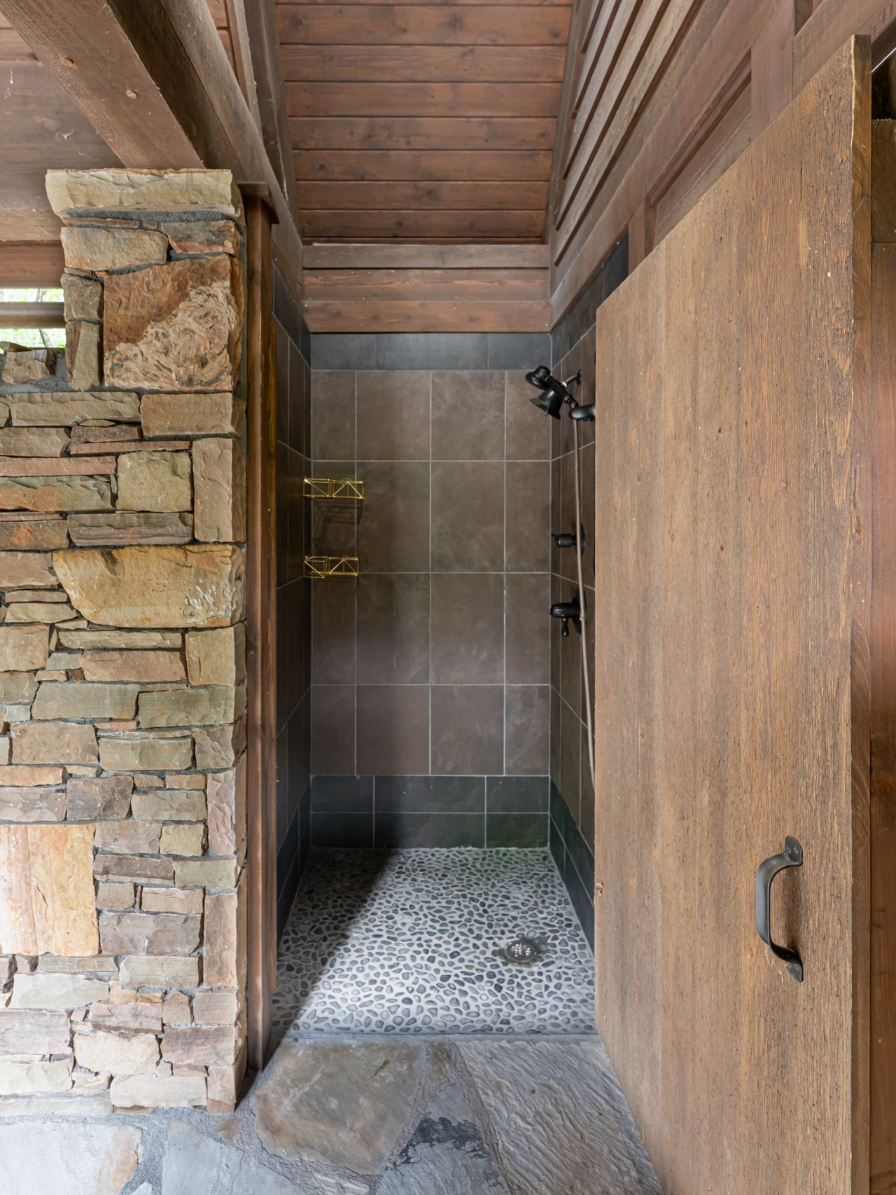 outdoor shower in poolhouse