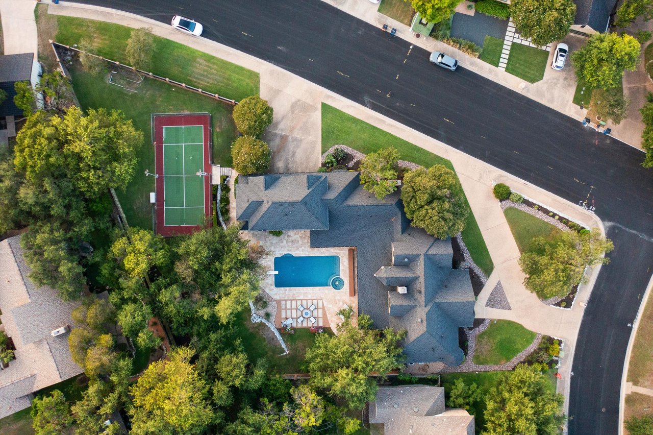 Northwest Hills legacy home with sport court, pool, and dream backyard.
