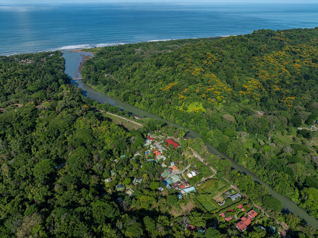 0.50 ACRES – 5 Bedroom Riverfront Modern Home, Walking Distance To Dominical!!!
