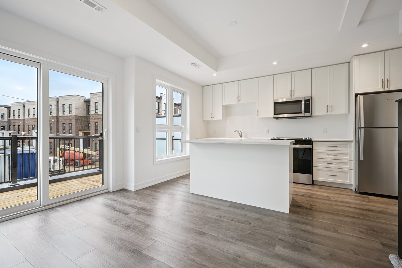 Brand-new, never-lived-in stacked townhome