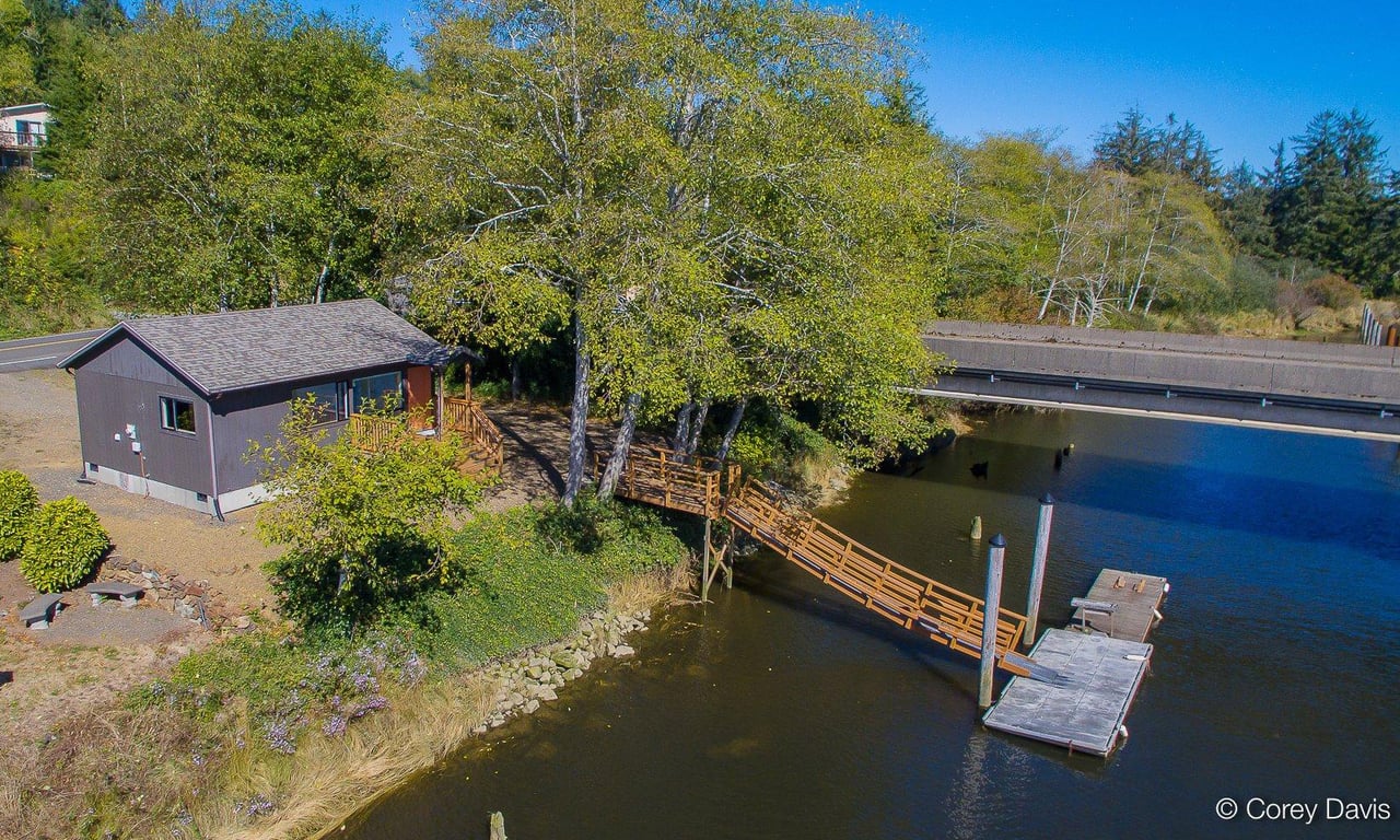 Sold waterfront cottage at 38225 North Fork Rd in Nehalem Oregon represented by Meadow Davis of Home + Sea Realty