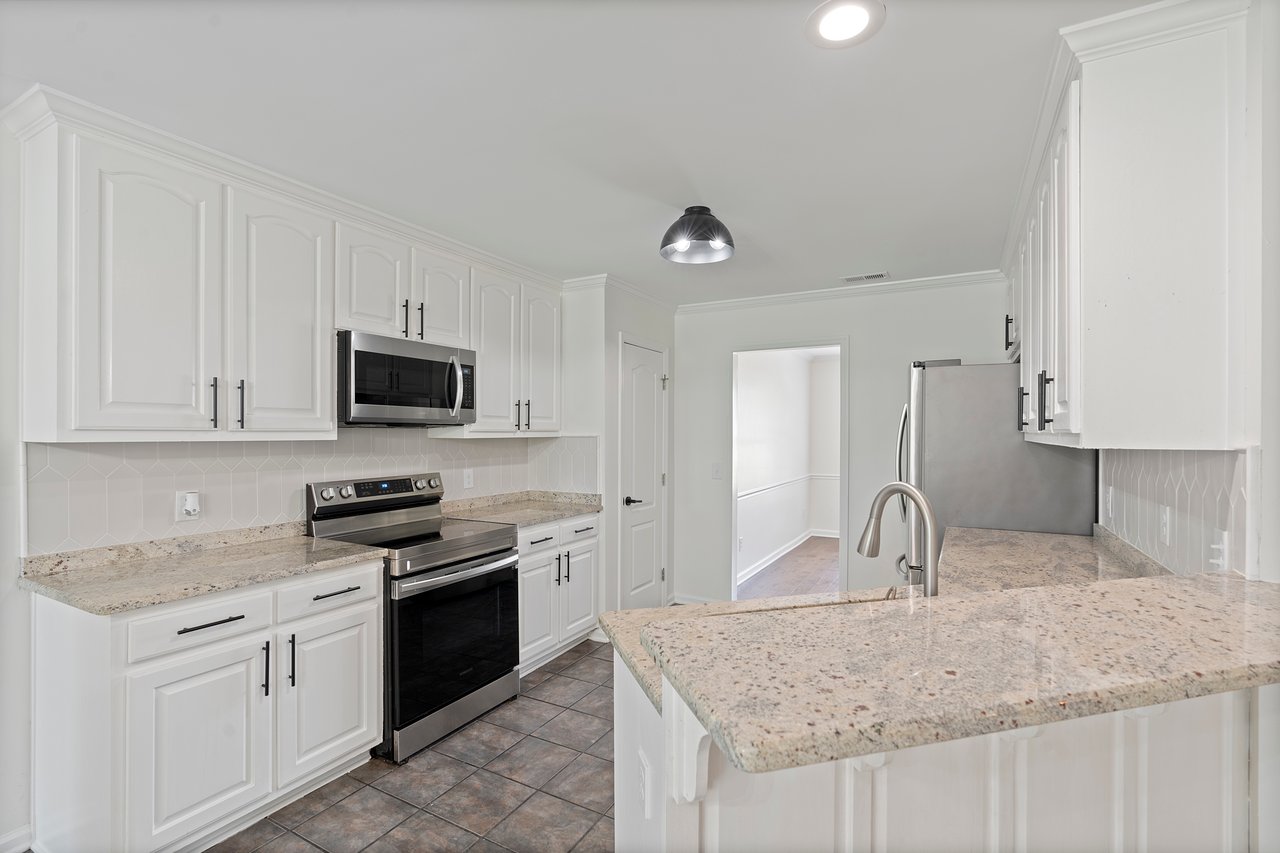 Updated Four Bedroom Home in Harvest!