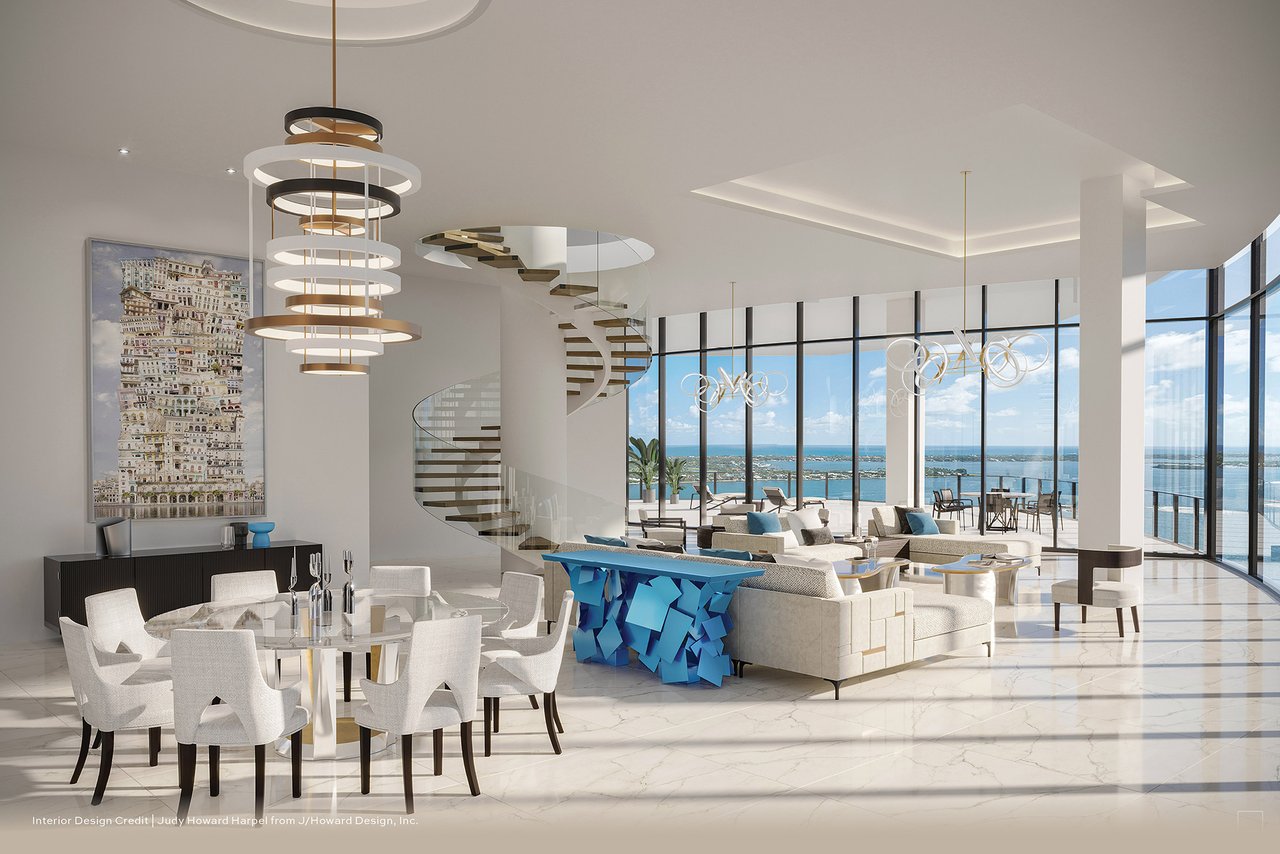 Rendering of the Forté on Flagler penthouse living and dining room with a curved staircase and tall waterfront windows.