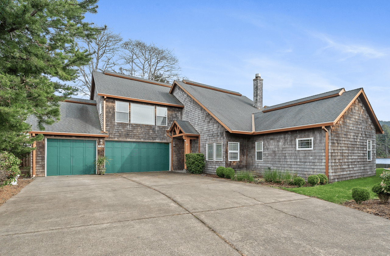 Sold lakefront home at 1405 Pansy Ct in Rockaway Beach Oregon overlooking Spring Lake