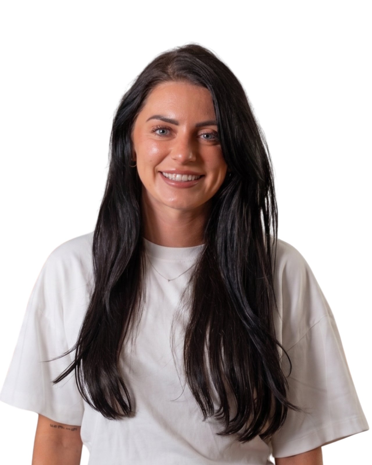 Alison Dean smiling in a white shirt against a plain white background.