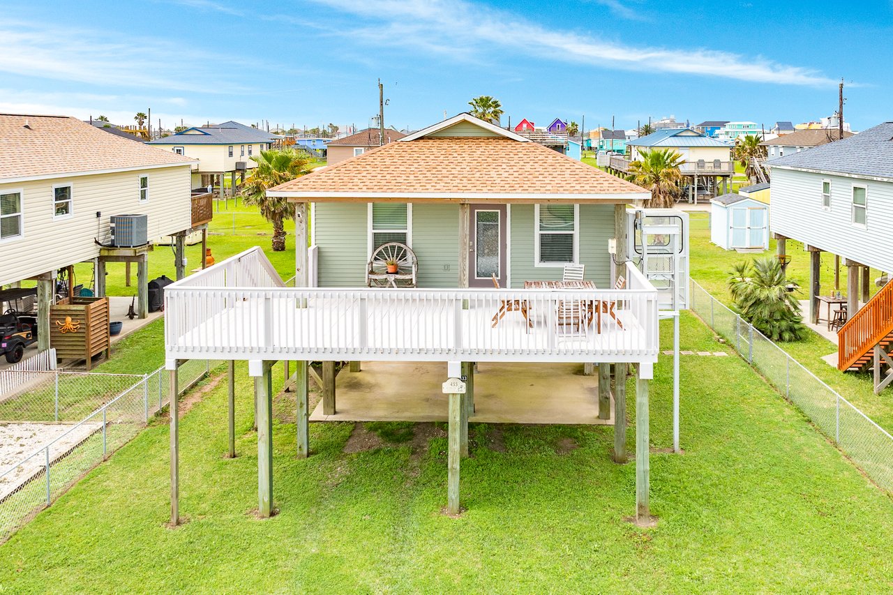Spacious deck on a large fenced lot for sale in Surfside Beach Texas.