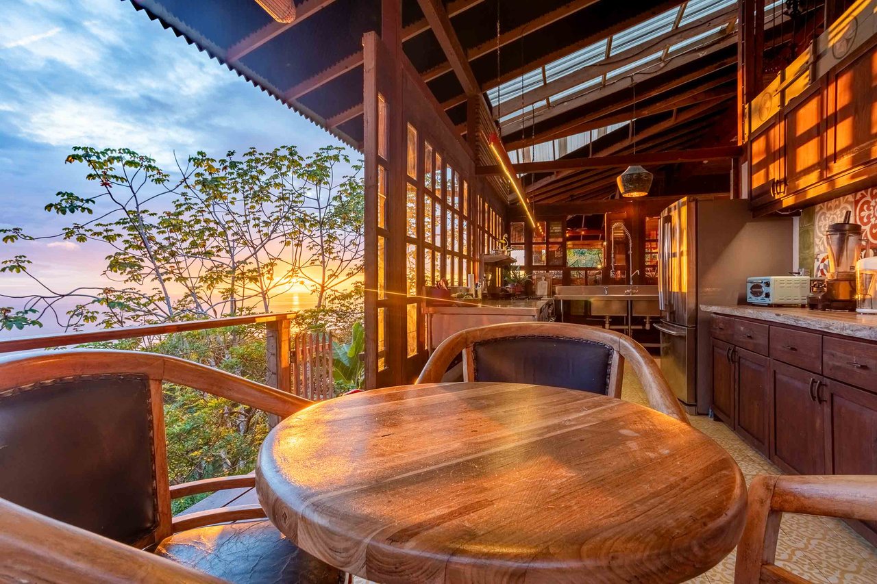 A Handcrafted Residence Immersed in Nature Above the Canopy Ocean View Architectural Home