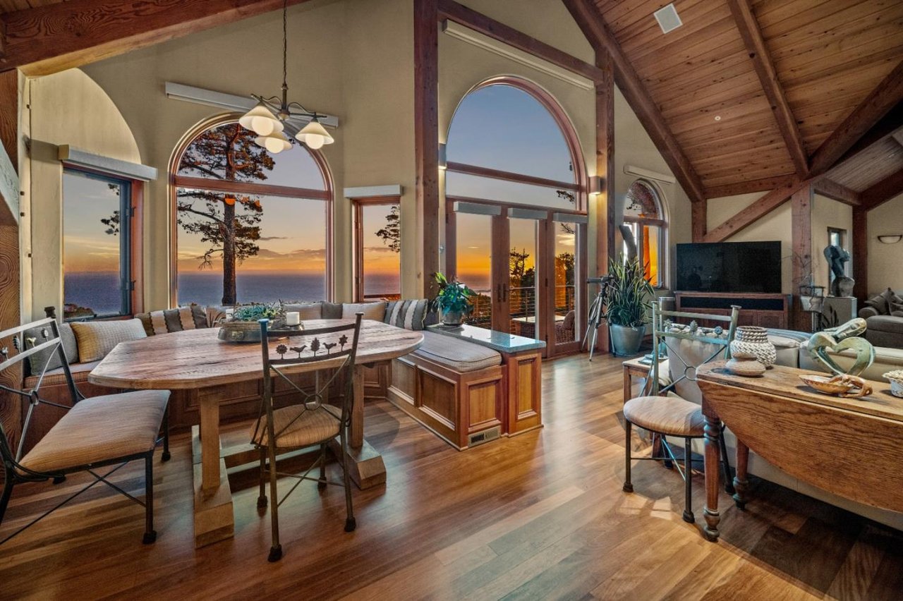 Dining area with large windows overlooking ocean views at 24 Mentone Road