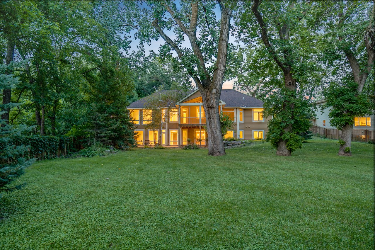 Sprawling, Custom Built, Walkout Rambler on Large Wooded Lot