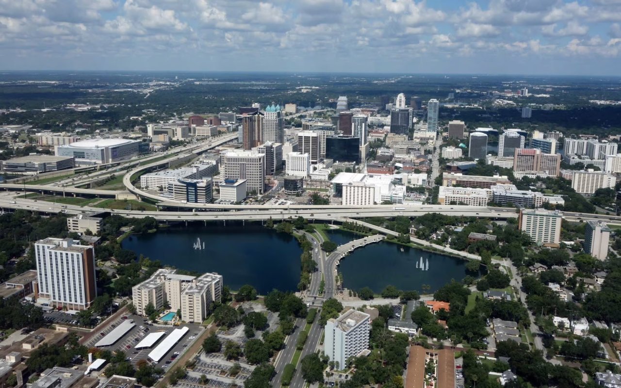 Modern view of SoDo Orlando featuring contemporary homes, local shops, and easy access to downtown Orlando