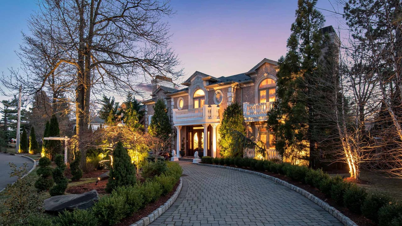 Large mansion home with circular driveway