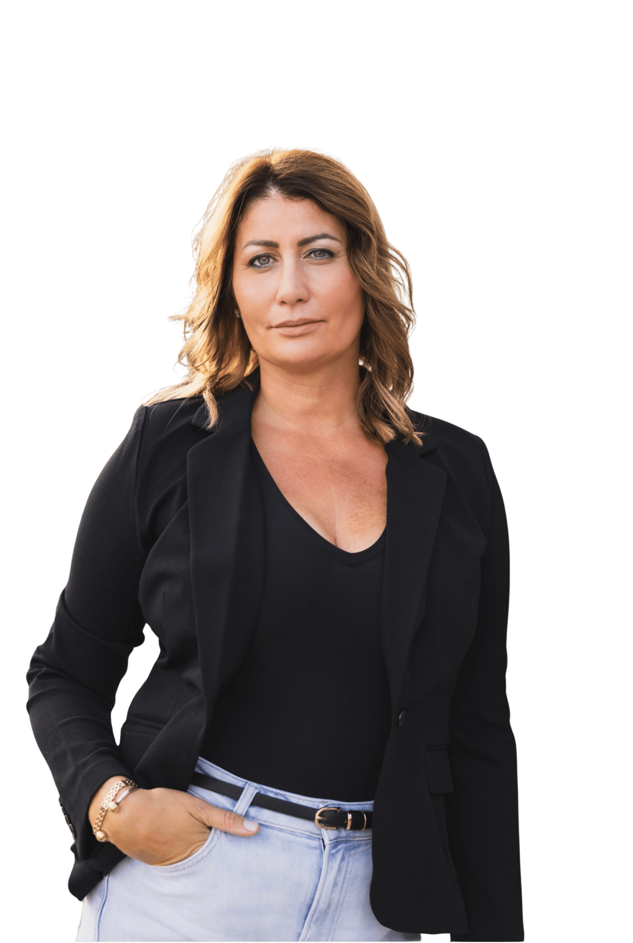 Tinna Jonsdottir wearing a black blazer and light jeans.