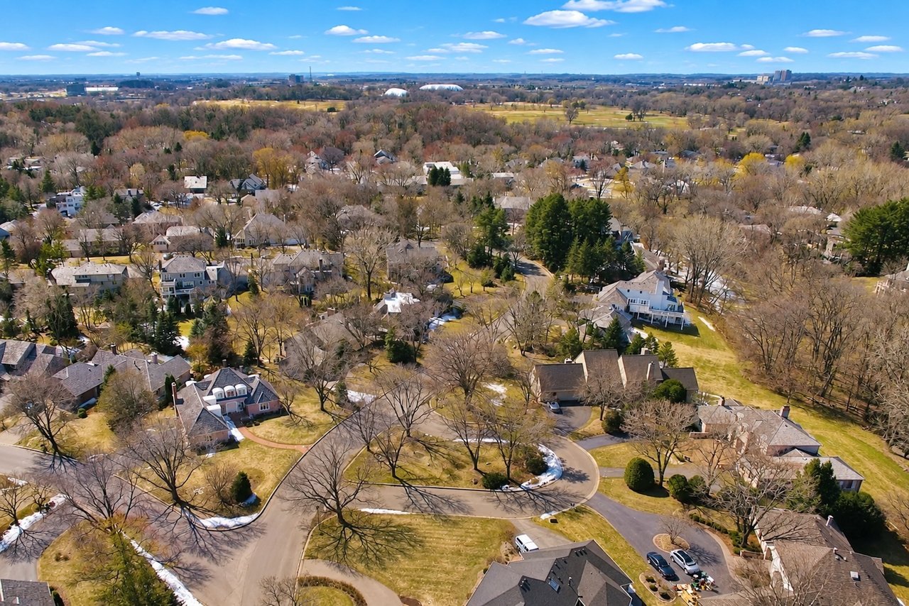 Aerial view of the Dewey Hill neighborhood in Edina, Minnesota, showing mature trees, residential streets, and neighborhood homes.