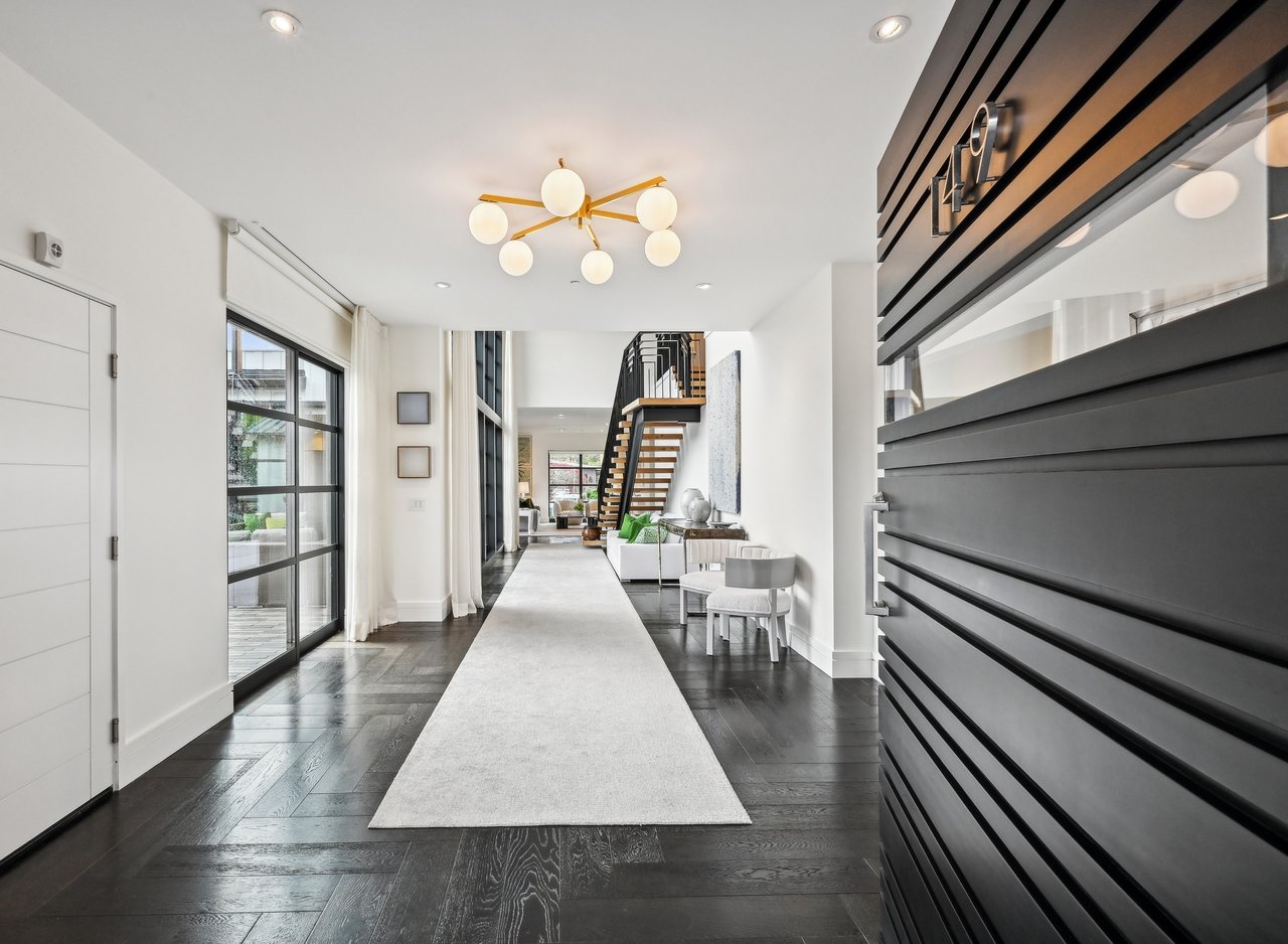 A Waterfront Masterpiece of Modern Luxury