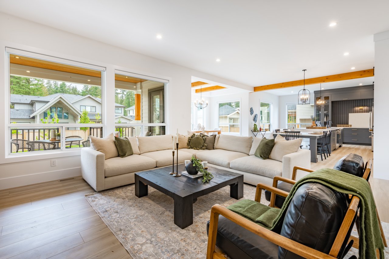 Beautifully staged luxury Lake Tahoe living room with mountain views prepared for sale